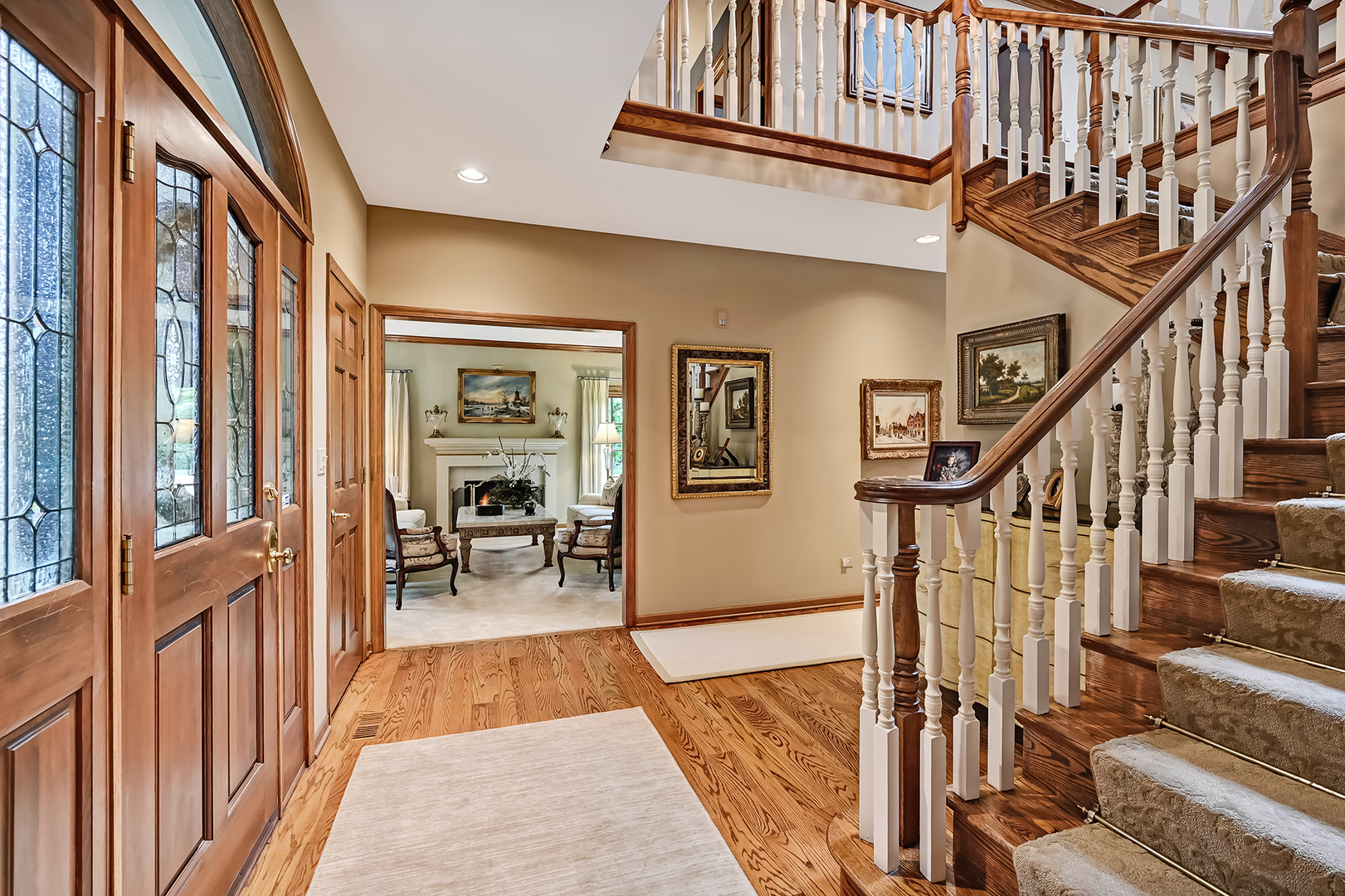 2 Hampton Court Burr Ridge, IL 60527 - Photo 4 of 38 a view of entryway and hall with wooden floor