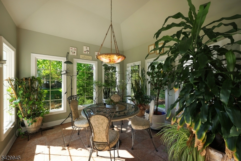 72 Mine Brook Road Bernards, NJ 07931 - Photo 11 of 28 a view of a dining room with furniture window and outside view