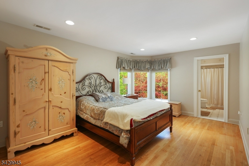 72 Mine Brook Road Bernards, NJ 07931 - Photo 16 of 28 a bed sitting in a spacious bedroom next to a window