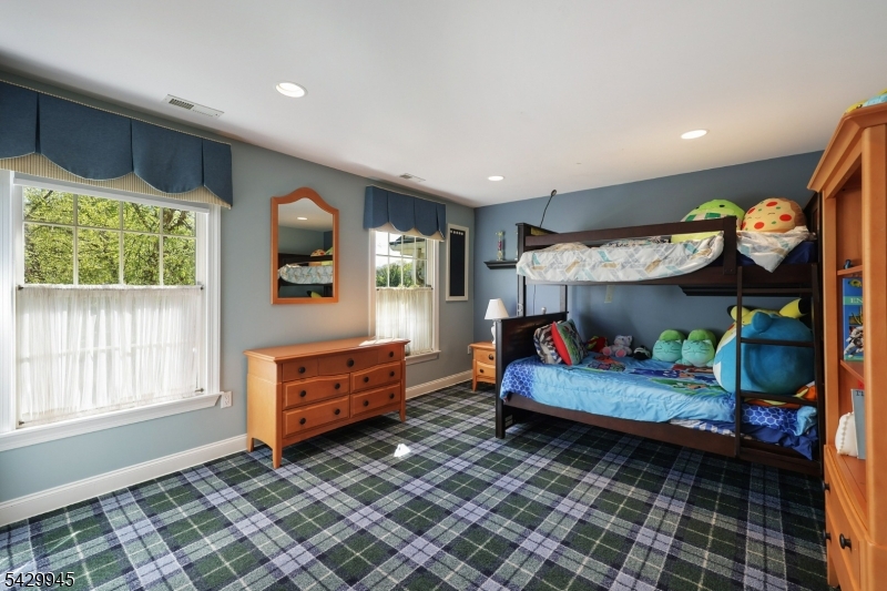 72 Mine Brook Road Bernards, NJ 07931 - Photo 17 of 28 a bedroom with a bed and wooden floor