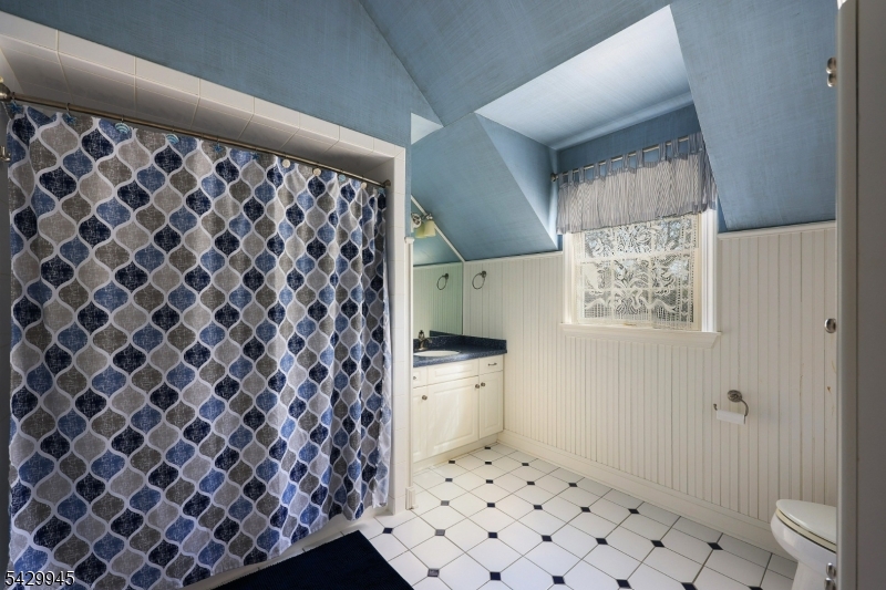 72 Mine Brook Road Bernards, NJ 07931 - Photo 18 of 28 a bathroom with a black white checkered floor