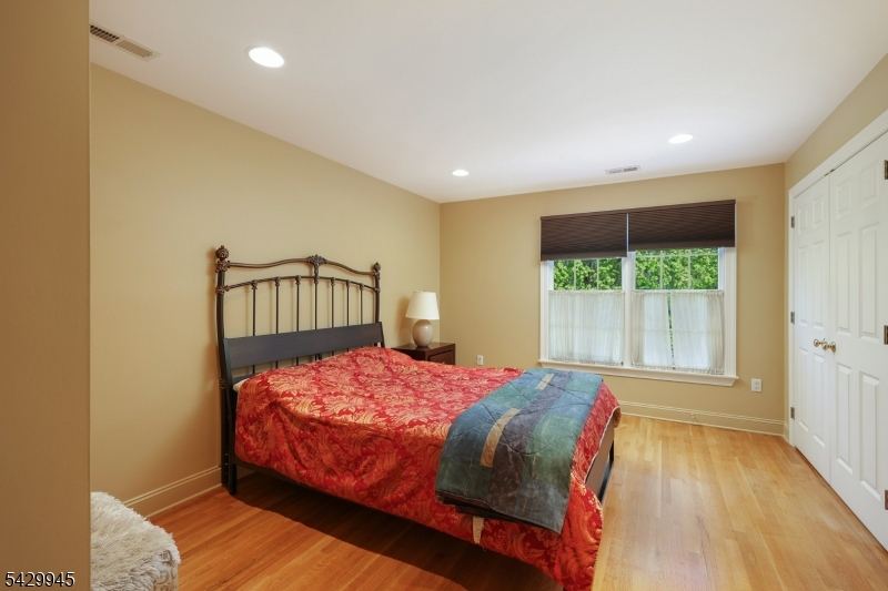 72 Mine Brook Road Bernards, NJ 07931 - Photo 19 of 28 a bedroom with a bed and a window