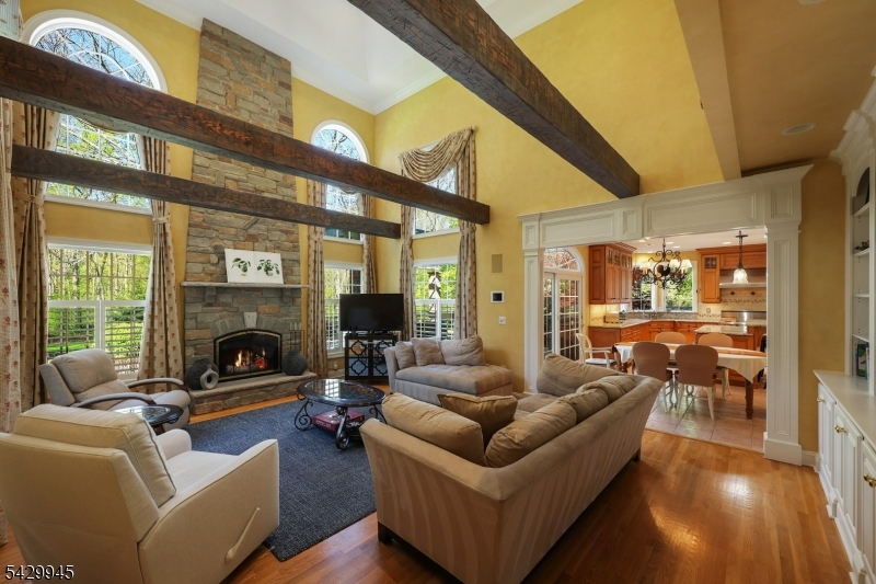 72 Mine Brook Road Bernards, NJ 07931 - Photo 3 of 28 a living room with furniture fireplace and a large window