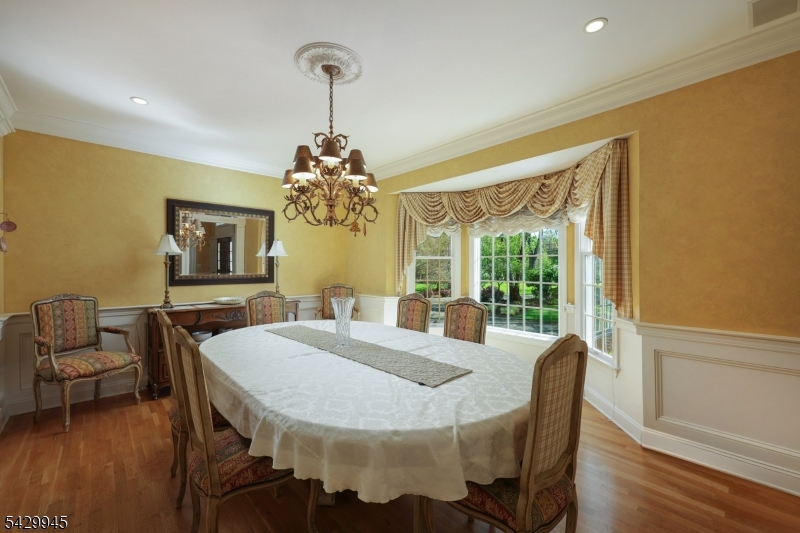72 Mine Brook Road Bernards, NJ 07931 - Photo 9 of 28 a view of a dining room with furniture window and wooden floor