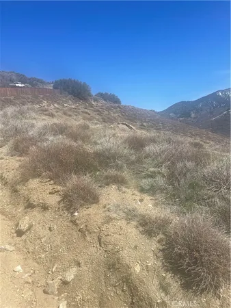 a view of mountain view with mountains in the background
