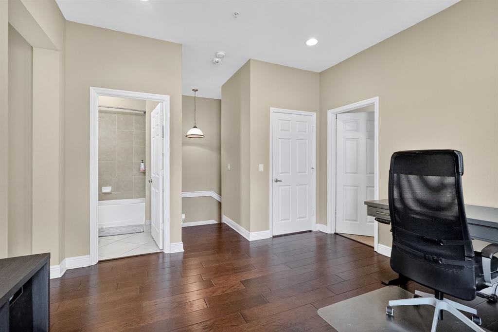 2669 Southwest 118 Road Miramar, FL 33025 - Photo 17 of 28 a view of a workspace with wooden floor and bathroom