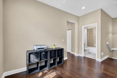 a view of a livingroom with furniture and wooden floor