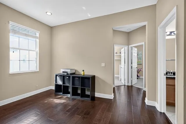 a view of a livingroom with furniture and wooden floor