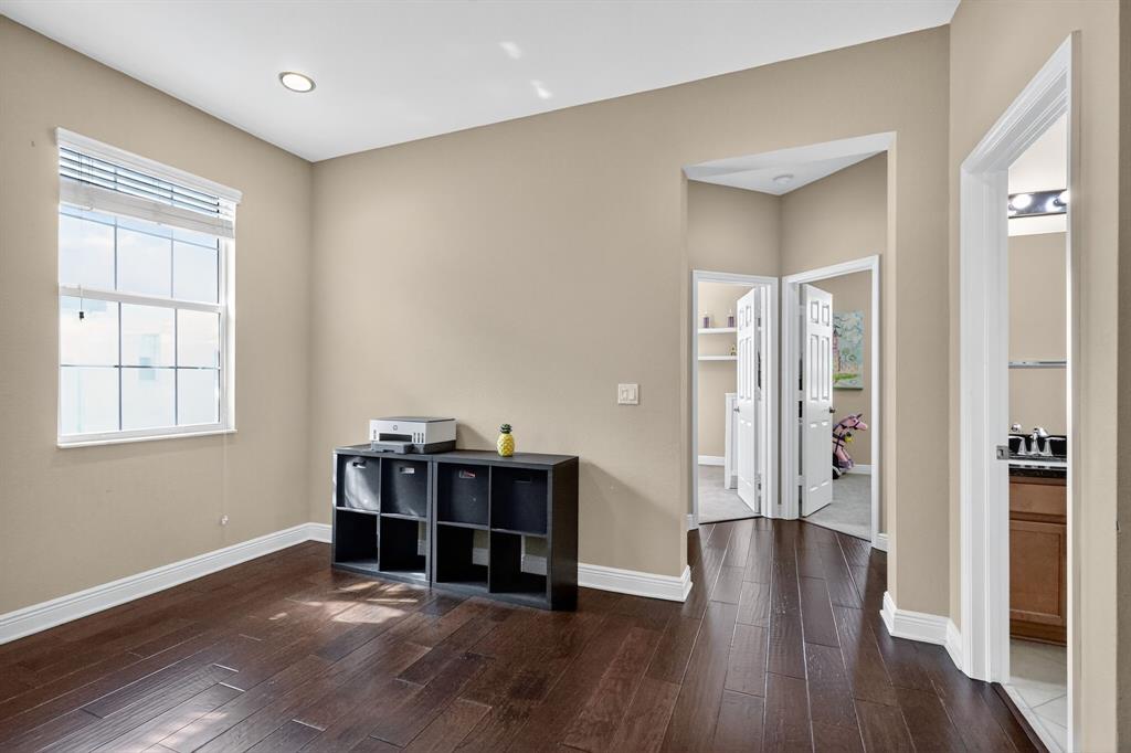 2669 Southwest 118 Road Miramar, FL 33025 - Photo 19 of 28 a view of a livingroom with furniture and wooden floor