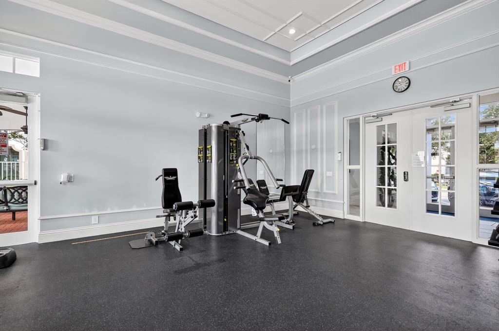 2669 Southwest 118 Road Miramar, FL 33025 - Photo 26 of 28 a view of a livingroom with gym equipment