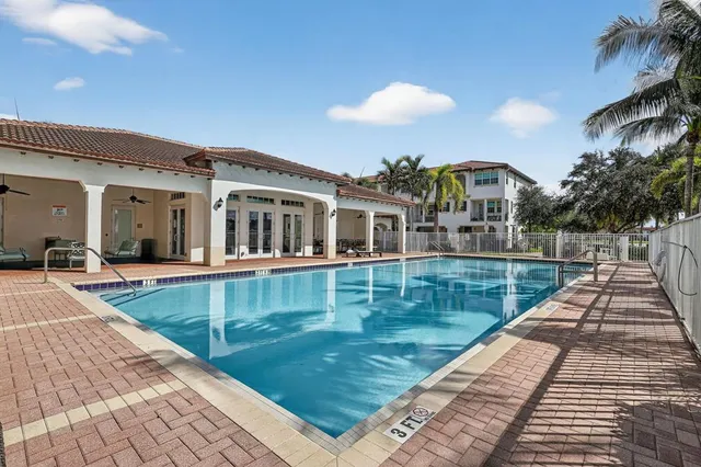a view of a house with a swimming pool