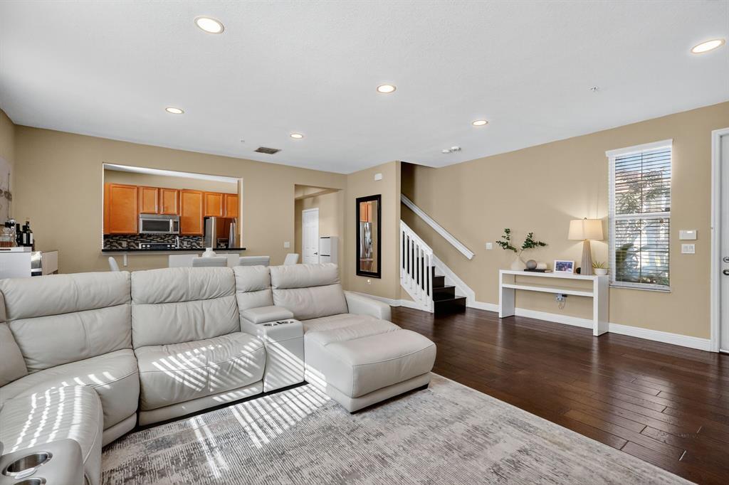 2669 Southwest 118 Road Miramar, FL 33025 - Photo 3 of 28 a living room with furniture and wooden floor