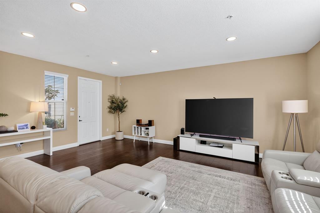 2669 Southwest 118 Road Miramar, FL 33025 - Photo 5 of 28 a living room with furniture and a flat screen tv