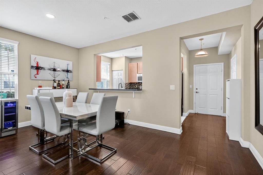 2669 Southwest 118 Road Miramar, FL 33025 - Photo 6 of 28 a view of a dining room with furniture and wooden floor
