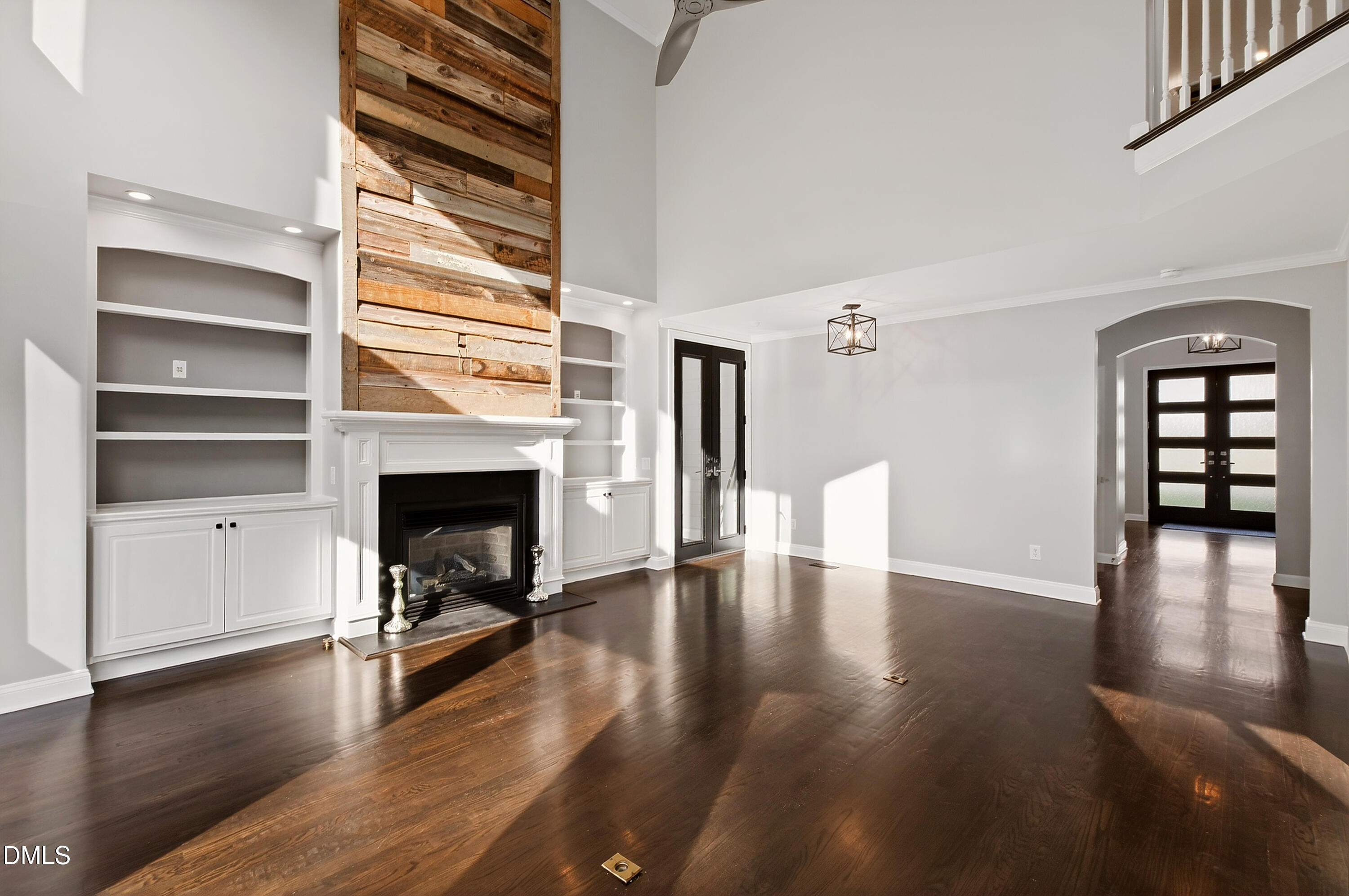 12408 Cilcain Court Raleigh, NC 27614 - Photo 21 of 80 a view of a livingroom with wooden floor and a fireplace