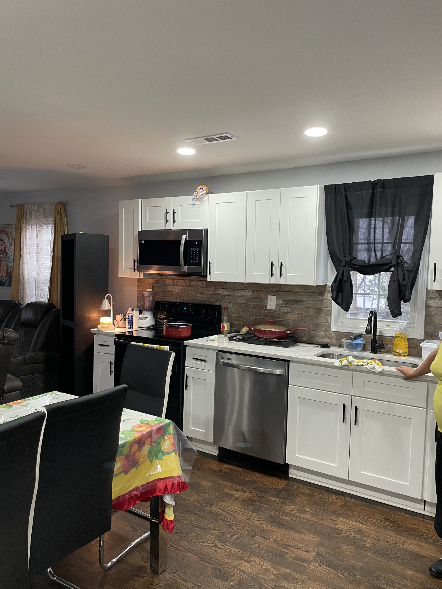 1161 Main Street Clarksville, TN 37040 - Photo 12 of 26 a kitchen with a sink cabinets and appliances