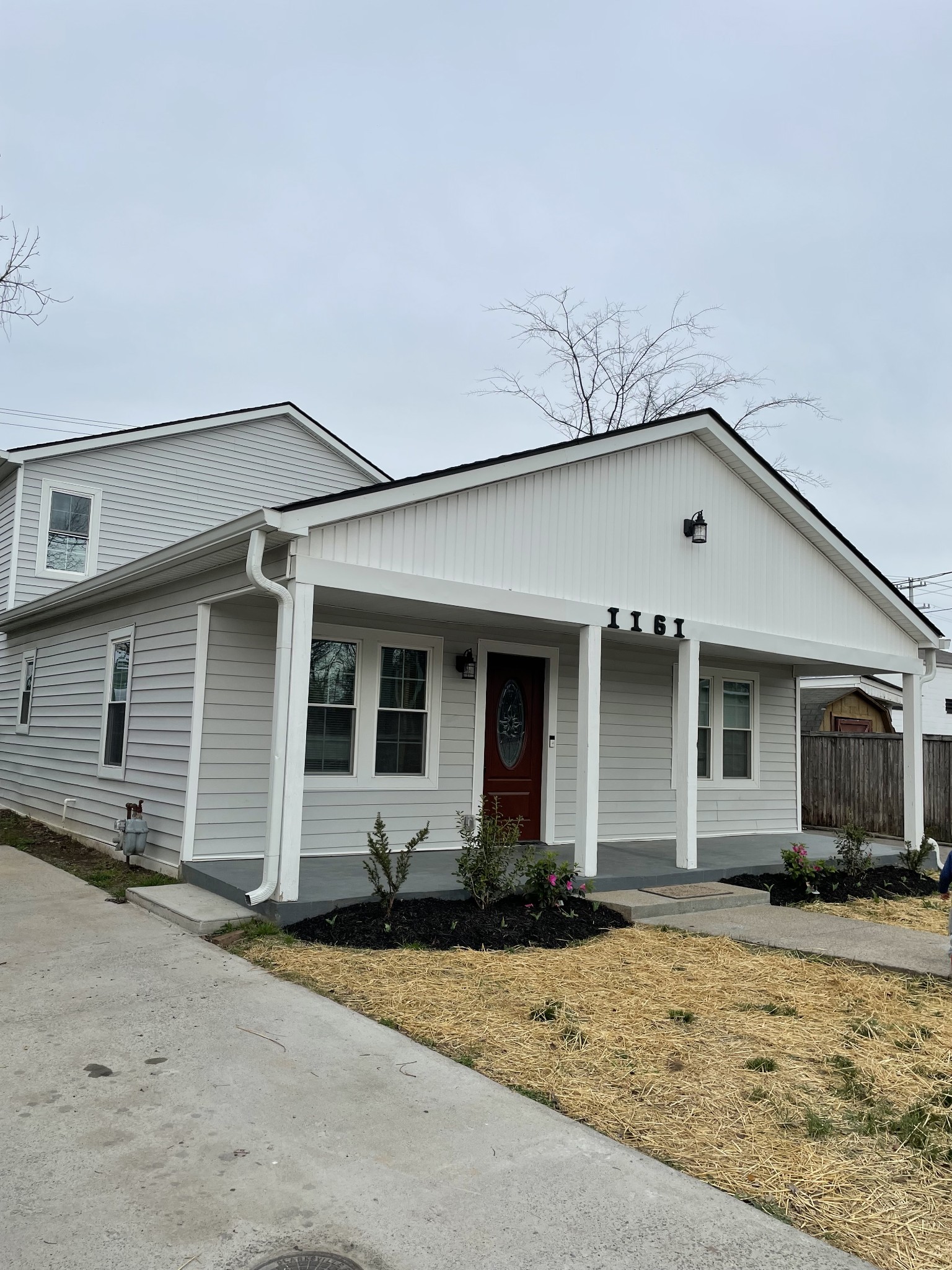 1161 Main Street Clarksville, TN 37040 - Photo 19 of 26 a front view of a house with a yard