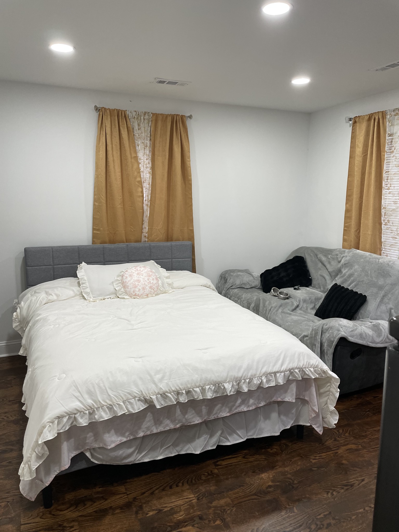 1161 Main Street Clarksville, TN 37040 - Photo 4 of 26 a bedroom with a bed and wooden floor