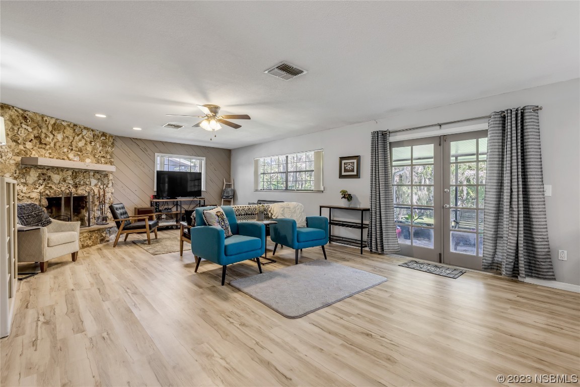 131 Silver Circle Edgewater, FL 32141 - Photo 11 of 30 a living room with furniture window and wooden floor