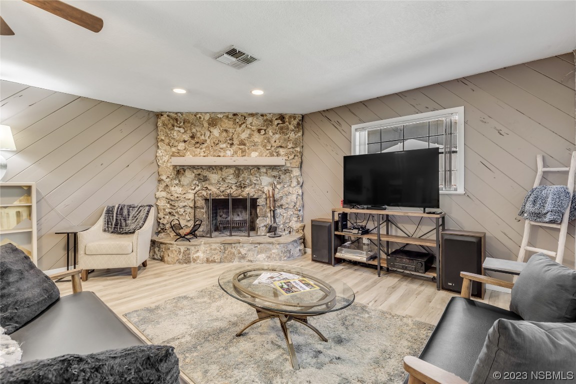 131 Silver Circle Edgewater, FL 32141 - Photo 14 of 30 a living room with furniture and a flat screen tv