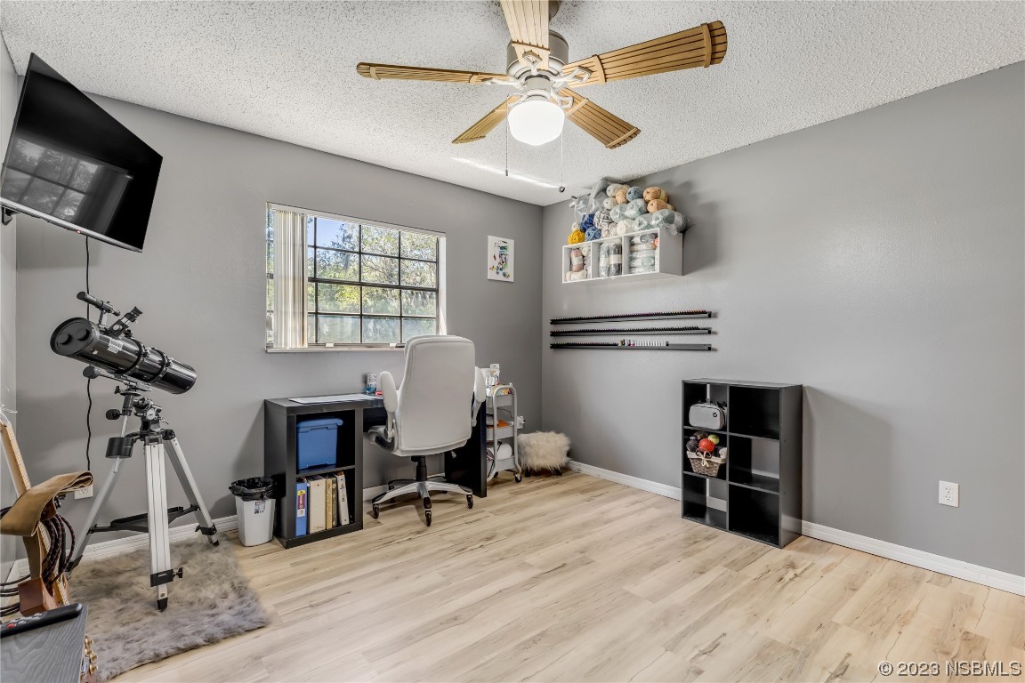 131 Silver Circle Edgewater, FL 32141 - Photo 16 of 30 a view of a room with gym equipment