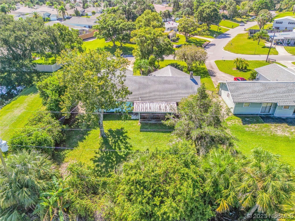 131 Silver Circle Edgewater, FL 32141 - Photo 26 of 30 a aerial view of a house with swimming pool and garden