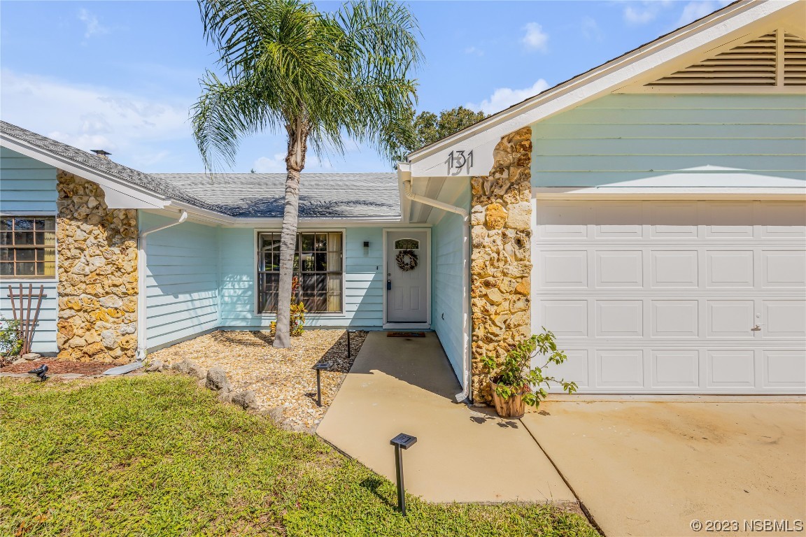 131 Silver Circle Edgewater, FL 32141 - Photo 3 of 30 a front view of a house having yard