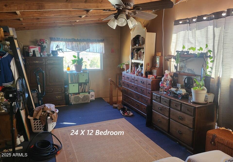 21750 North Ranch Road Williams, AZ 86046 - Photo 14 of 30 a view of a entryway with furniture and a potted plant