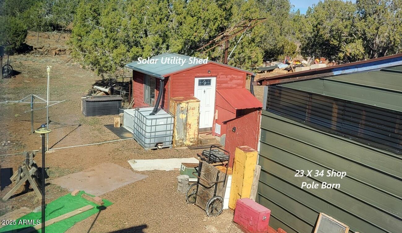 21750 North Ranch Road Williams, AZ 86046 - Photo 18 of 30 a front view of a house with a yard