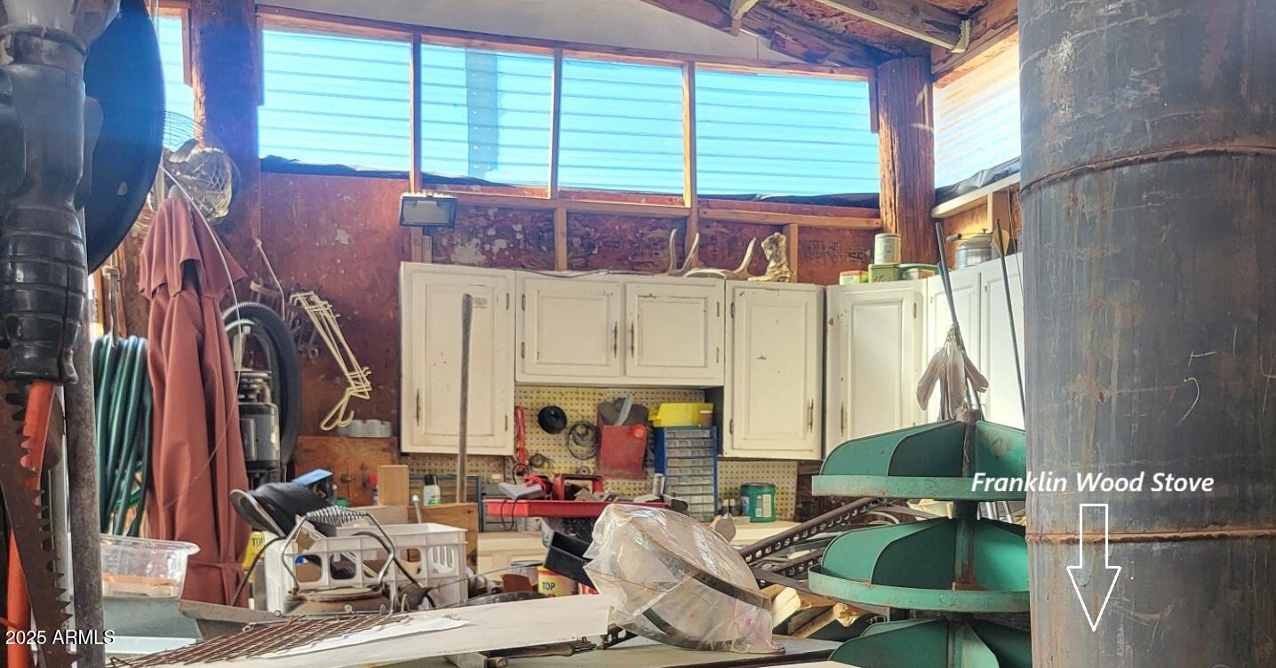 21750 North Ranch Road Williams, AZ 86046 - Photo 19 of 30 a living room filled with furniture and a fireplace