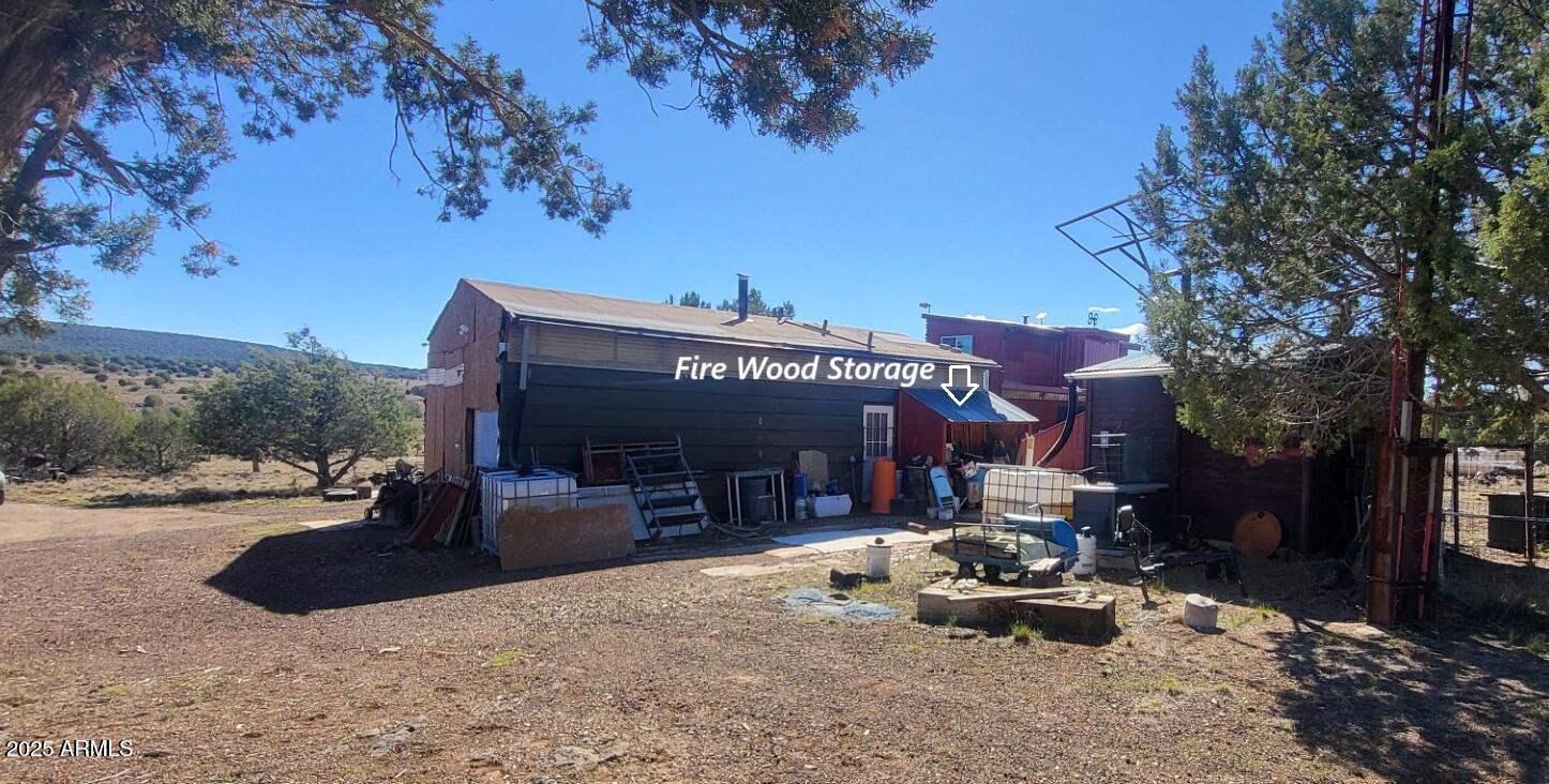 21750 North Ranch Road Williams, AZ 86046 - Photo 21 of 30 a view of a chairs and tables in the patio