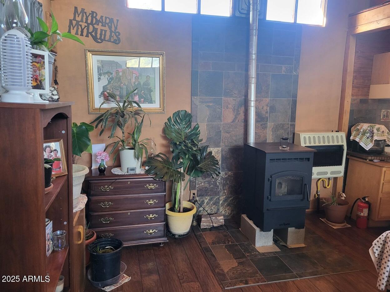 21750 North Ranch Road Williams, AZ 86046 - Photo 5 of 30 a vase of flowers sitting on a table in front of a building