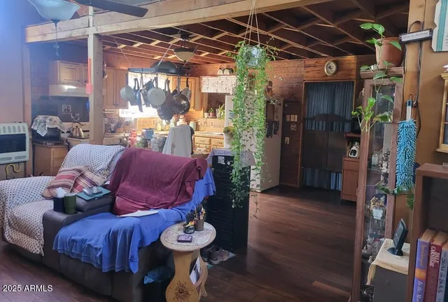 a table room with furniture and a potted plant