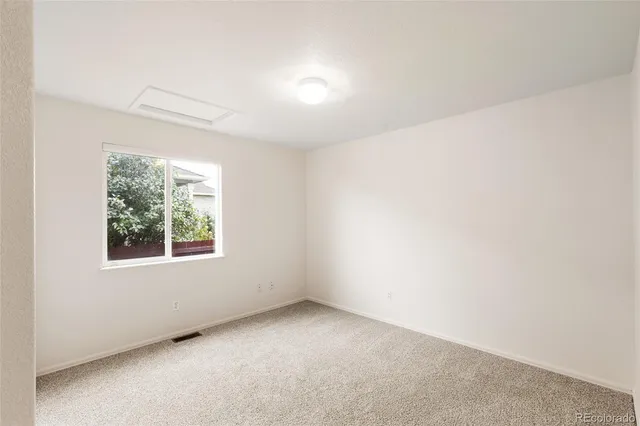an empty room with a window