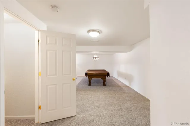 a bathroom with a sink and a window