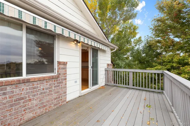 a view of roof deck with patio