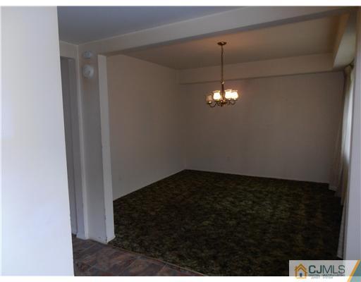 18 Edgewood Road Old Bridge, NJ 07747 - Photo 6 of 21 a view of a chandelier fan in a room