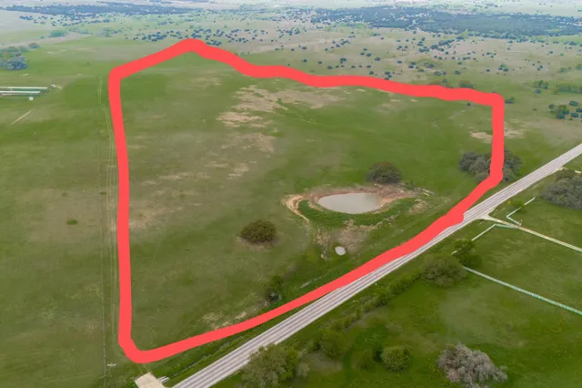 a view of a lake from a yard