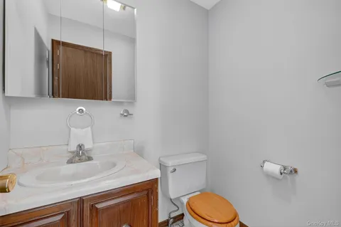 a kitchen view with a dining table and appliances