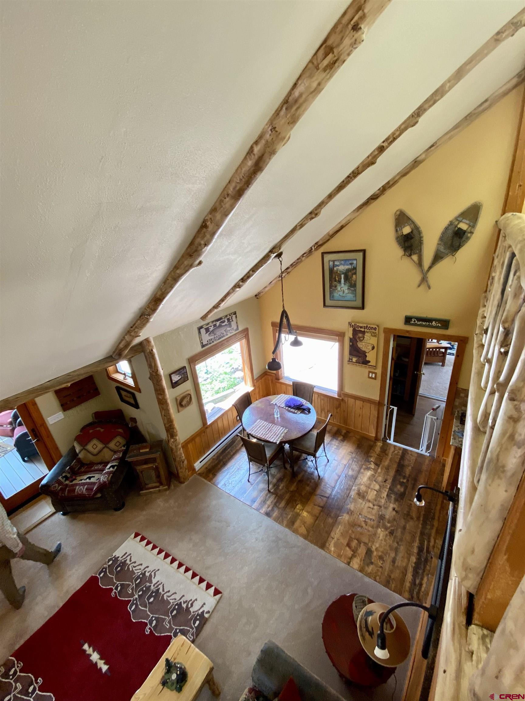 480 Bear Trail Montrose, CO 81403 - Photo 18 of 35 a living room with furniture and a rug