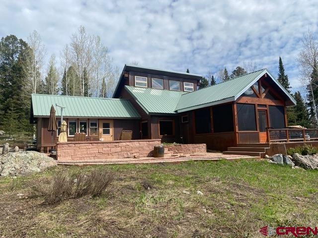 480 Bear Trail Montrose, CO 81403 - Photo 2 of 35 a front view of a house with a yard
