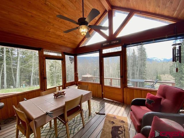480 Bear Trail Montrose, CO 81403 - Photo 23 of 35 a view of a livingroom with furniture and large windows