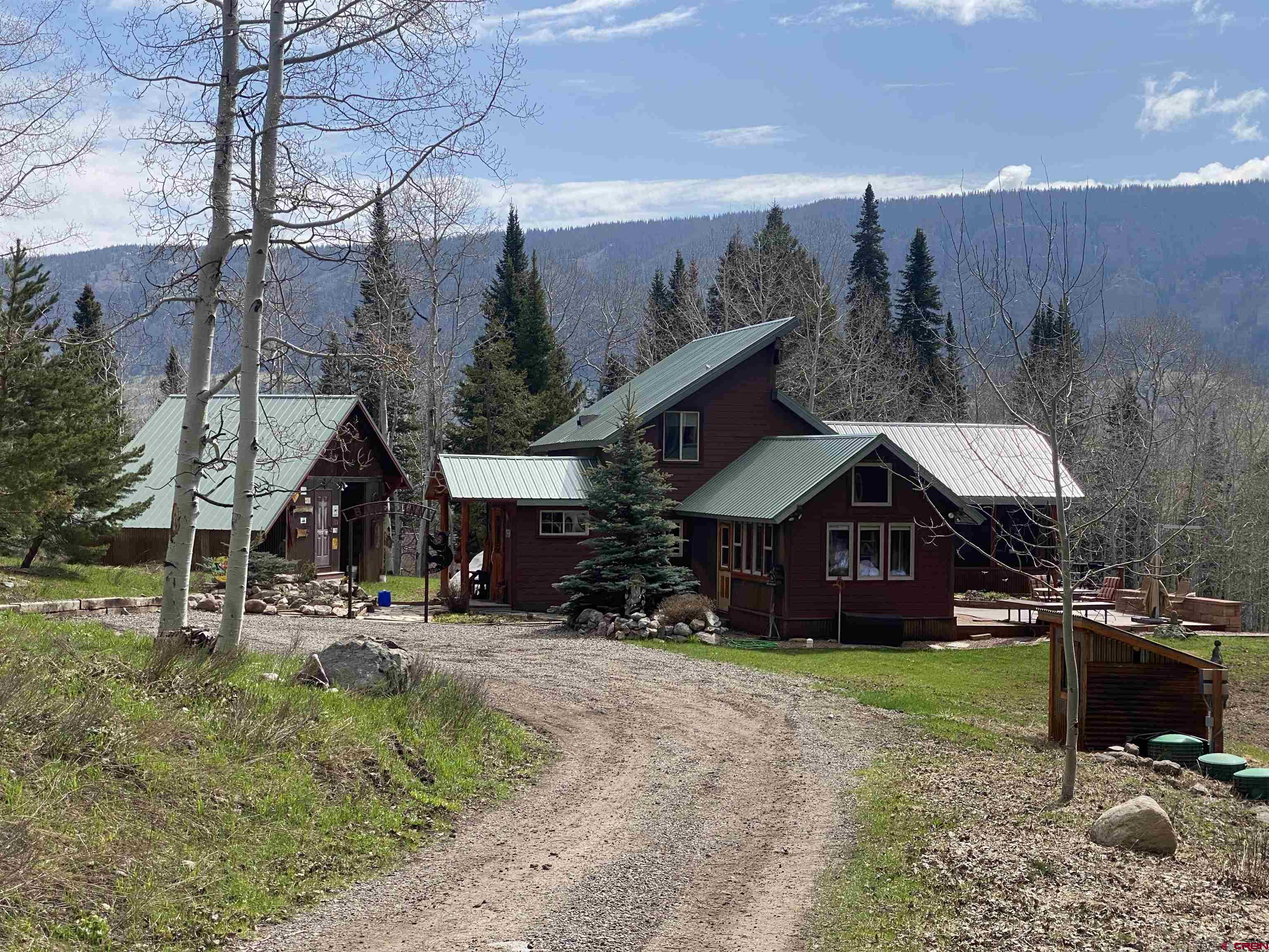 480 Bear Trail Montrose, CO 81403 - Photo 3 of 35 a front view of a house with garden