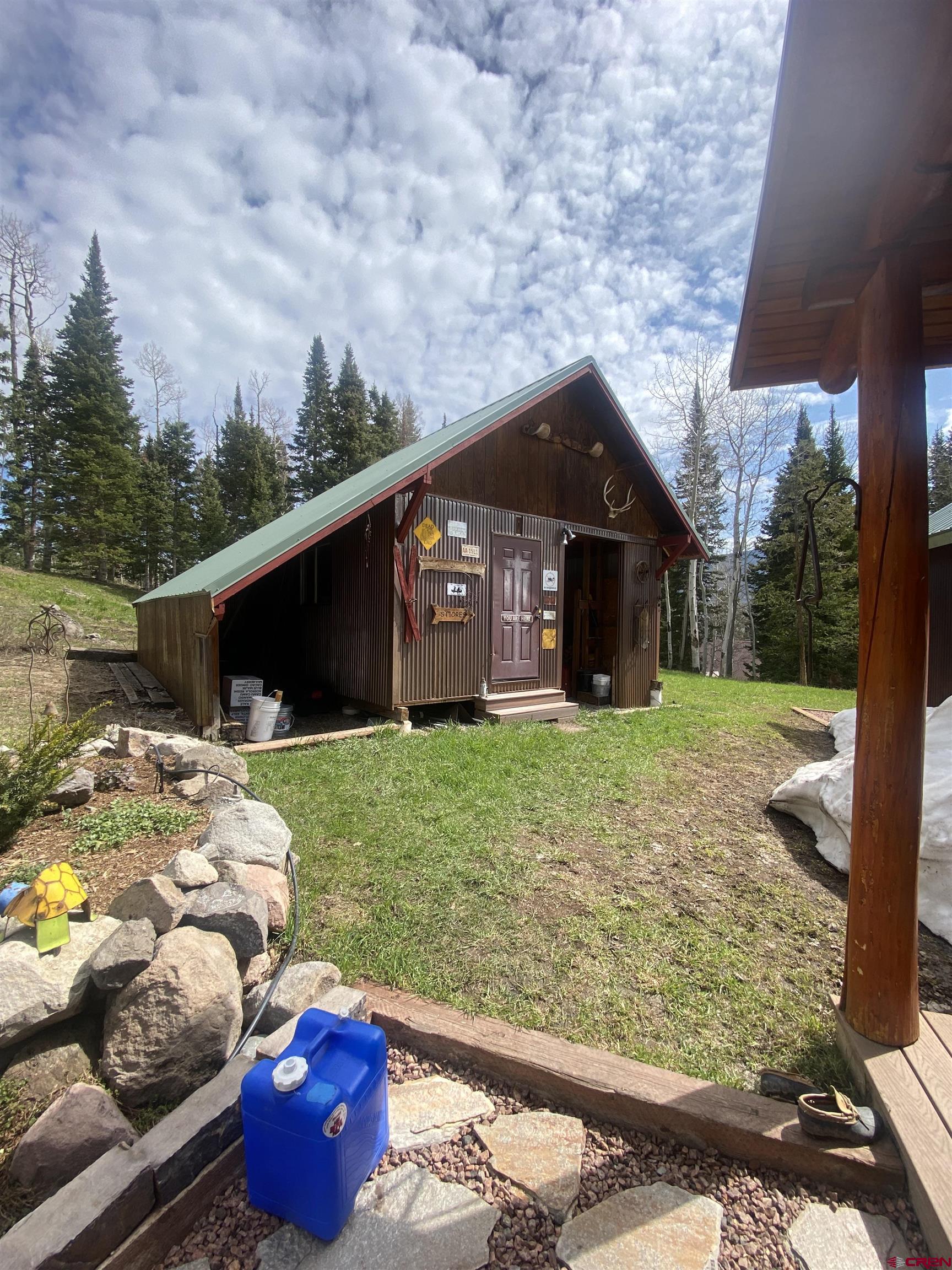 480 Bear Trail Montrose, CO 81403 - Photo 31 of 35 a front view of a house with garden