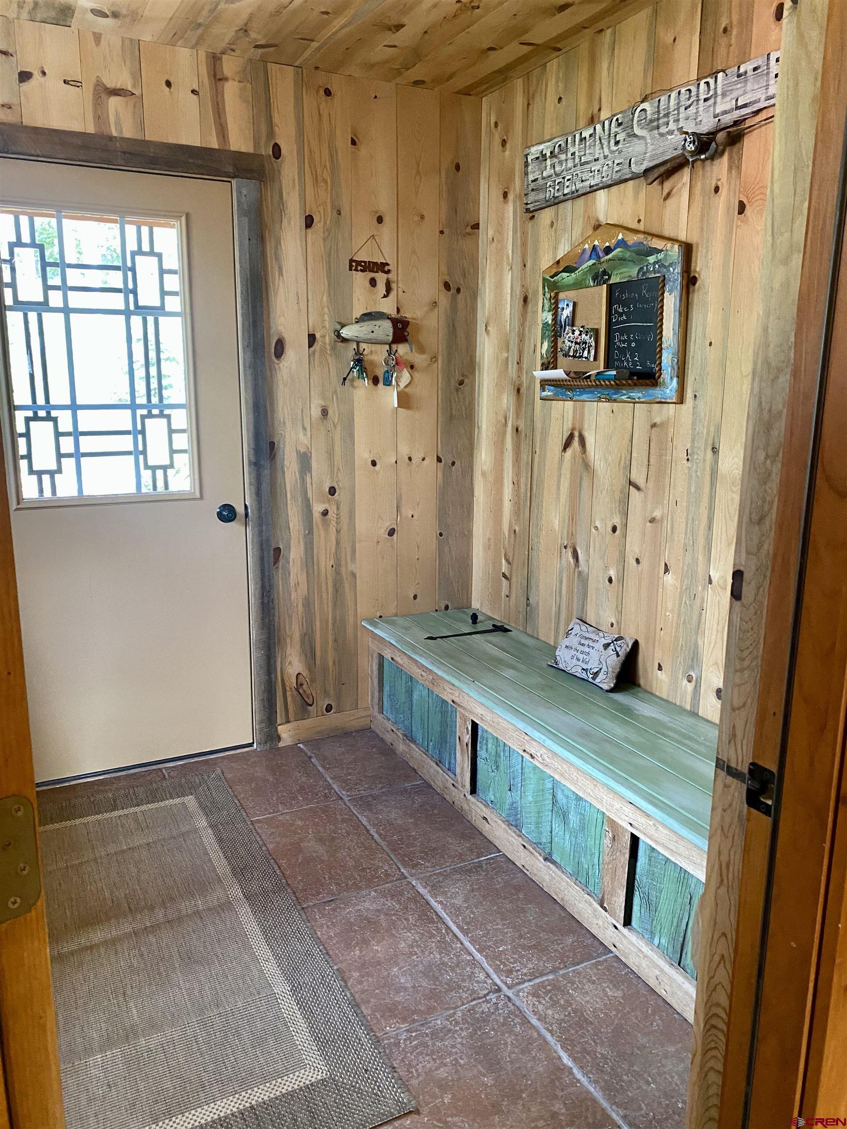 480 Bear Trail Montrose, CO 81403 - Photo 7 of 35 a view of an entryway with a front door