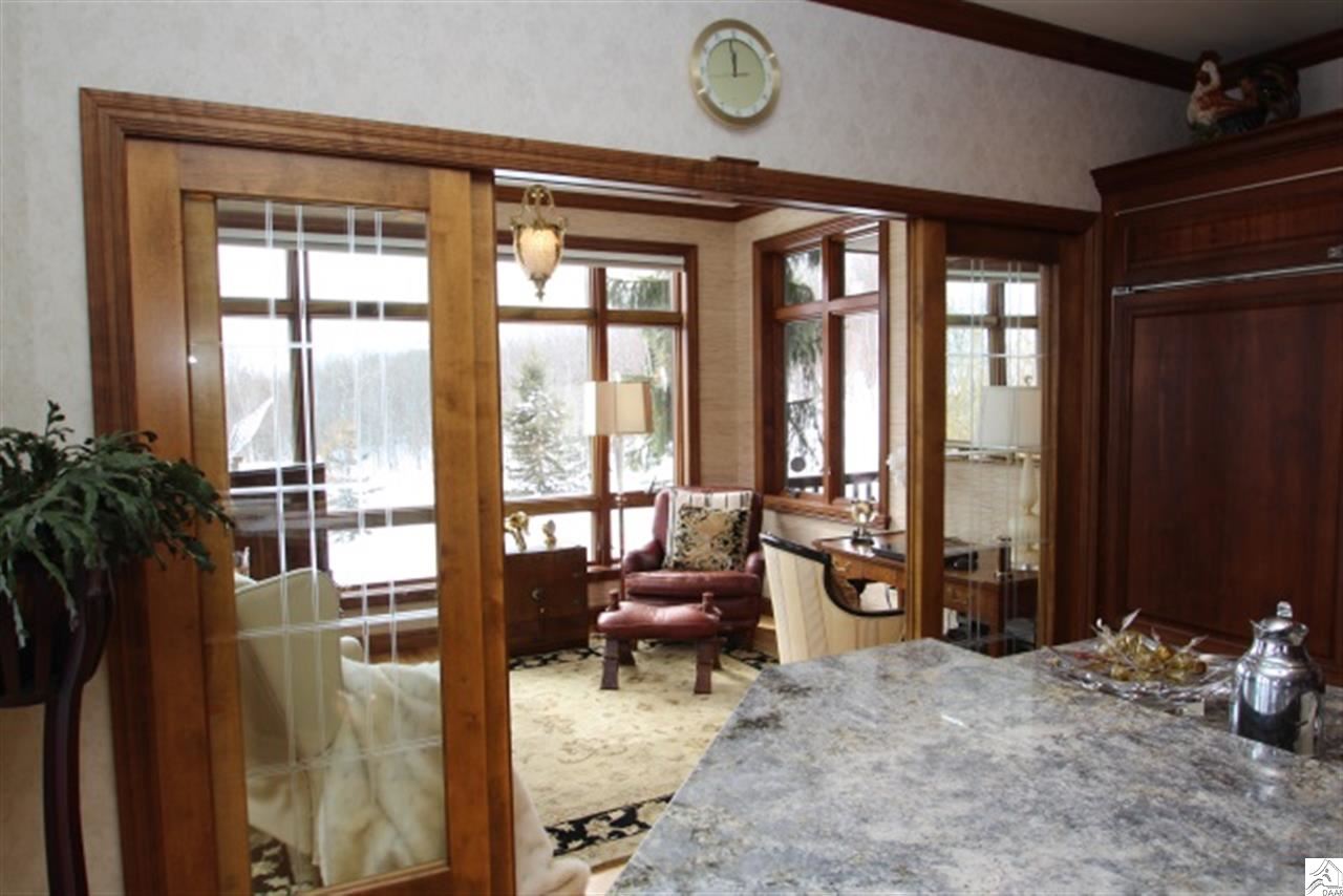 3345 Riley Road Duluth, MN 55803 - Photo 3 of 17 Bring the outdoors in with this window-full sunroom