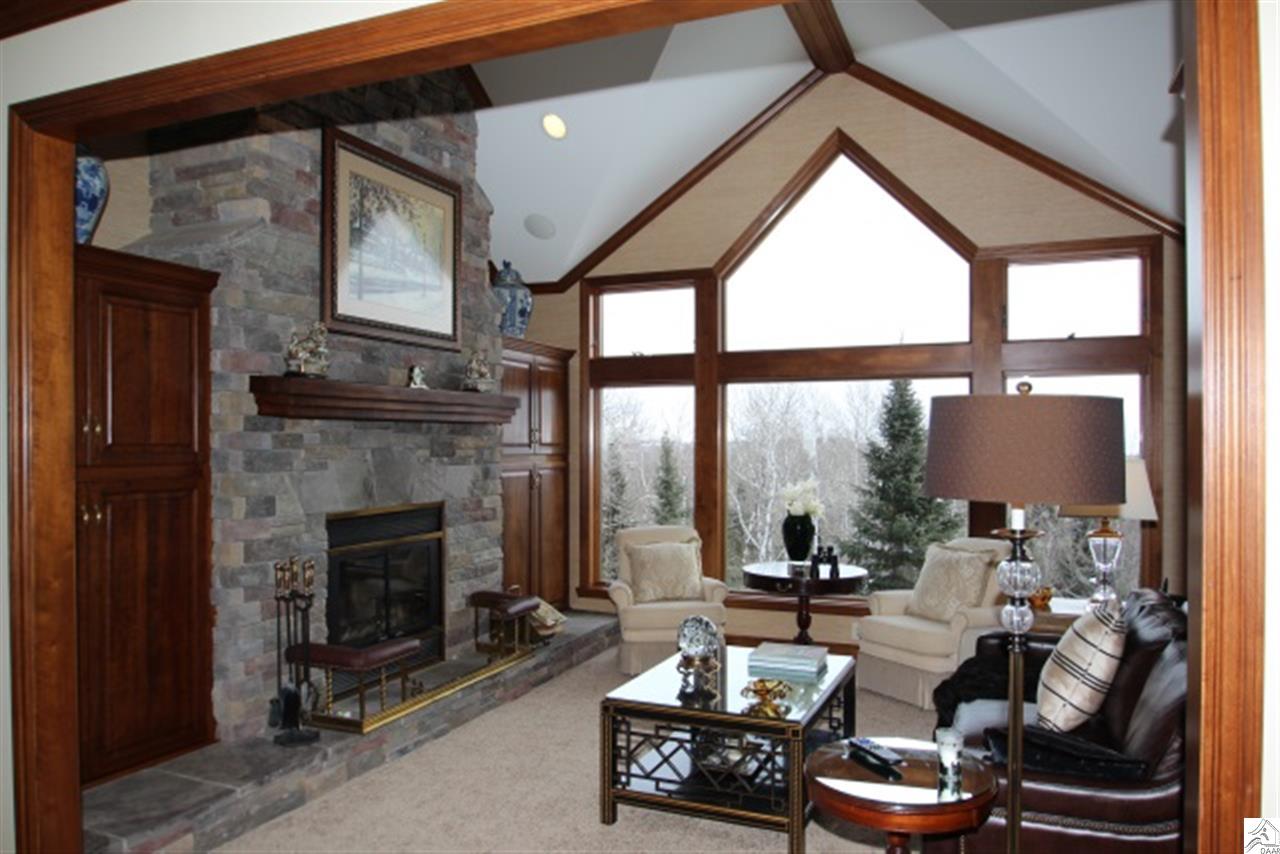 3345 Riley Road Duluth, MN 55803 - Photo 6 of 17 With a beautiful wood burning fireplace and a "dumb-waiter" to haul wood up from the basement!