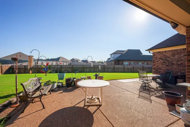 a view of a lake with a big yard