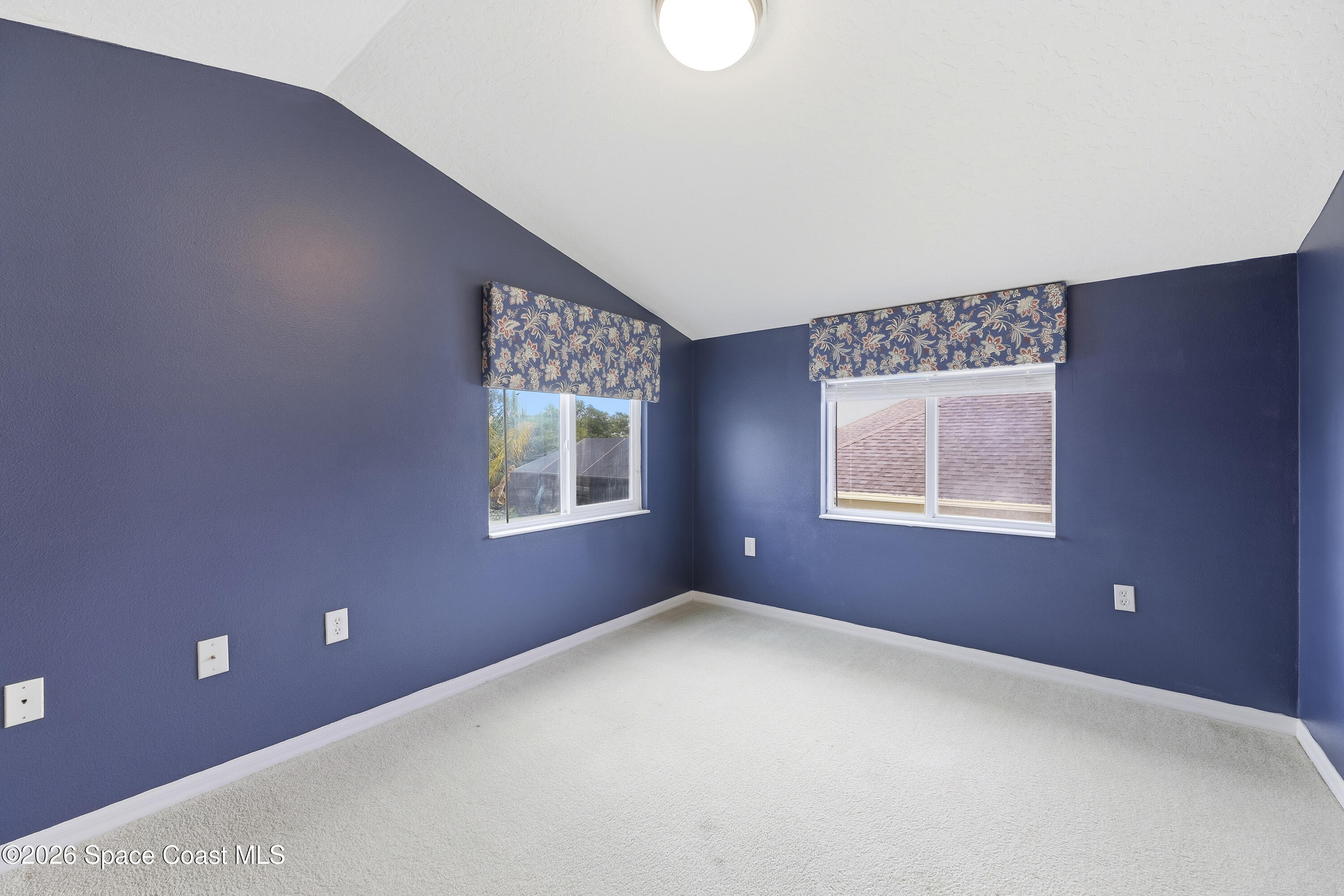 1643 Long Pine Road Melbourne, FL 32940 - Photo 45 of 63 a view of an empty room with a window
