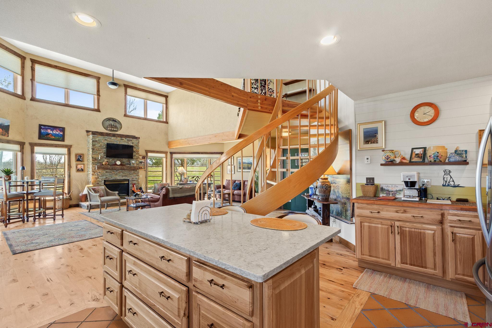13720 6000th Road Montrose, CO 81403 - Photo 14 of 36 a kitchen with stainless steel appliances granite countertop a stove and cabinets